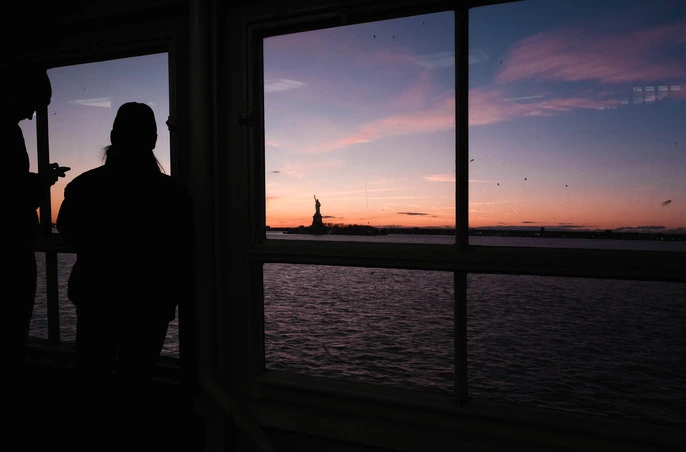 window on Staten Island ferry with silhouettes